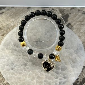 Handcrafted bracelet with heart charms